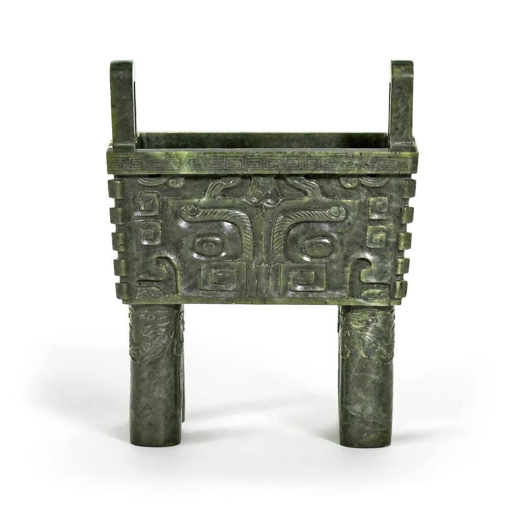View full screen - View 1 of Lot 19. A spinach-green jade archaistic vessel, fang ding, Incised mark and period of Qianlong | 清乾隆 碧玉仿古饕餮紋鼎 《大清乾隆年製》款.