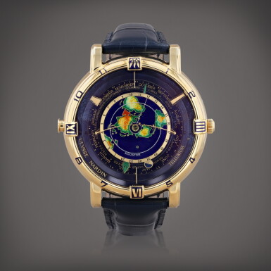 View full screen - View 1 of Lot 485. Tellurium Johannes Kepler, reference 871-99 Montre-bracelet astronomique en or jaune avec anneau extérieur avec pointeurs à tête et queue de dragon indiquant le mois et le signe du zodiaque, disque central rotatif en émail cloisonné représentant la terre vue du pôle Nord, double fuseau horaire, lune en rotation autour de la terre, spiral flexible du tropique du Cancer au tropique du Capricorne pour révéler la partie de la terre éclairée par le soleil et pour indiquer l'heure et le lieu du lever et du coucher du soleil | Yellow gold astronomic wristwatch with outer ring with dragon head and tail pointers indicating month and sign of the zodiac, rotating centre cloisonné enamel disc depicting the earth seen from above the North Pole, dual time zone, moon rotating around the earth, flexible spring bending from the Tropic of Cancer to the Tropic of Capricorn to reveal the part of the earth lit by the sun and to indicate the time and place of sunrise and sunset Vers 1992 | Circa 1992.