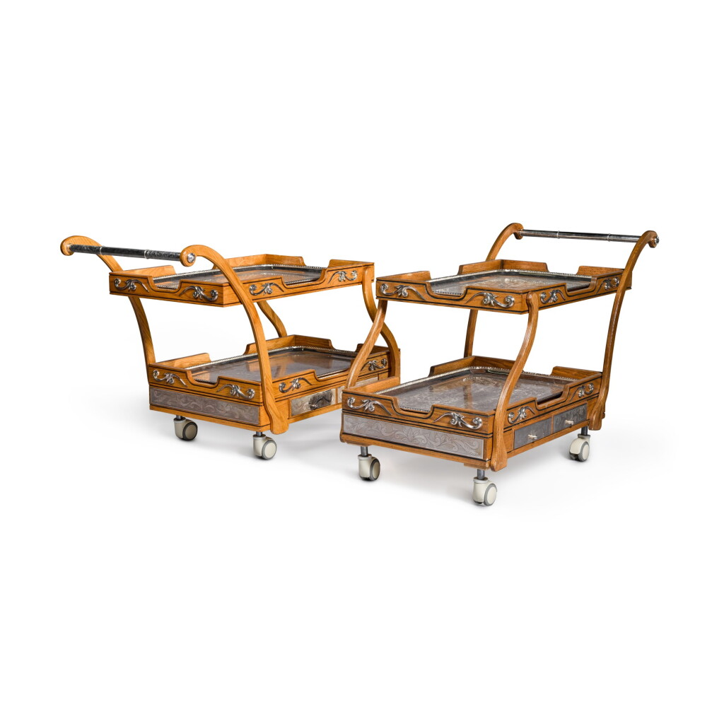 View full screen - View 1 of Lot 115. A pair of electroplate-mounted serving trolleys, 20th century.