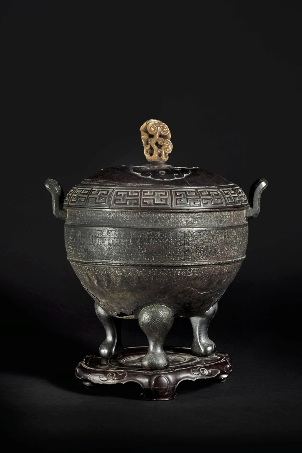 View full screen - View 1 of Lot 26. An archaic bronze tripod censer (Ding), Eastern Zhou dynasty, Spring and Autumn Period.