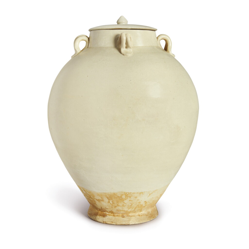 View full screen - View 1 of Lot 690. A WHITE-GLAZED HANDLED JAR AND COVER, TANG DYNASTY .