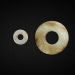 Two white jade discs, huan, Early Shang - Han dynasty | 商早期至漢 白玉環兩件