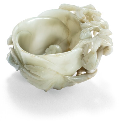 View full screen - View 1 of Lot 53. RINCE-PINCEAUX FLORAL EN JADE CÉLADON PÂLE SCULPTÉ DYNASTIE MING | 明 青白玉鏤雕枝葉花卉紋盃 | A floral pale celadon jade washer, Ming Dynasty.