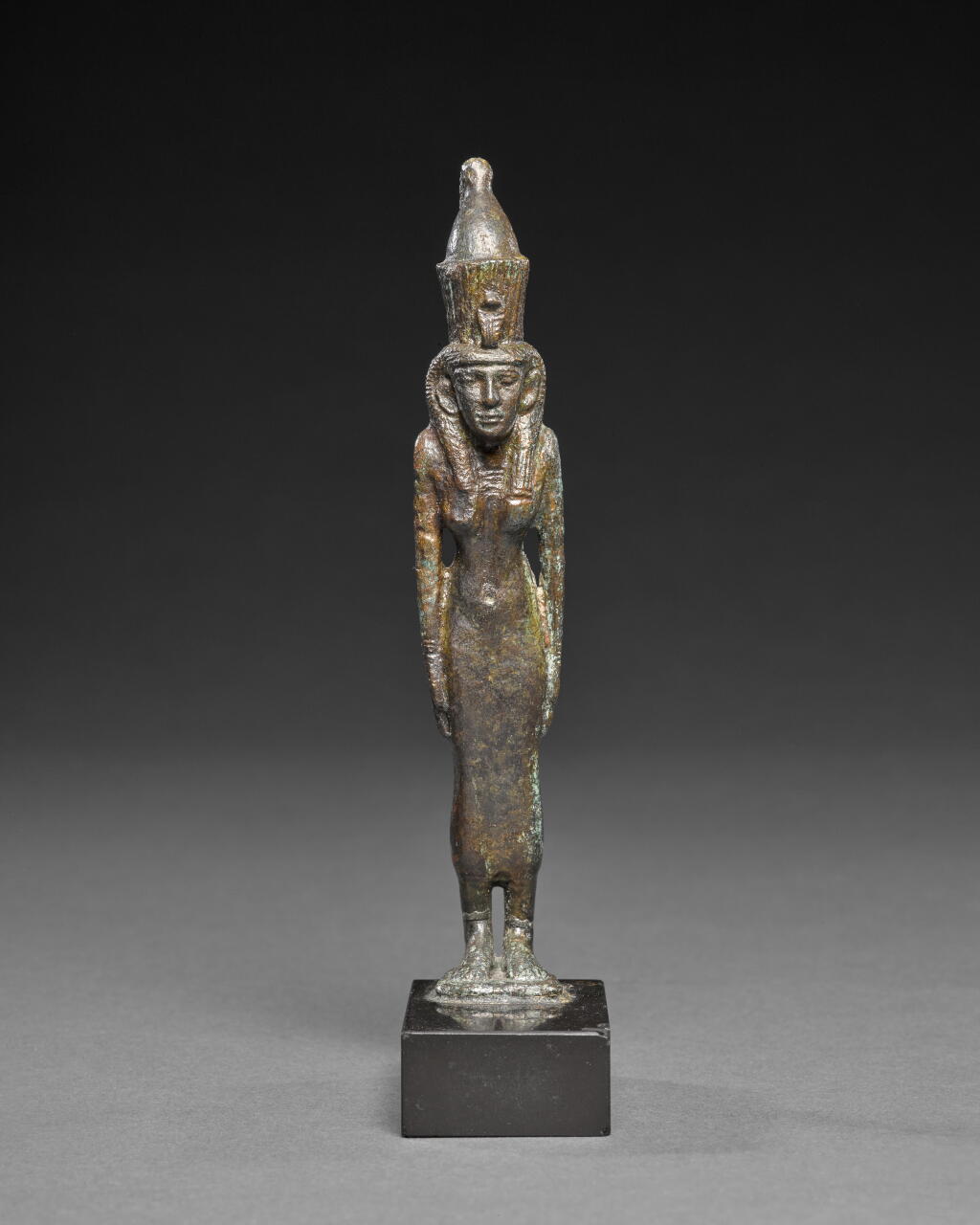 View full screen - View 1 of Lot 203. An Egyptian Bronze Figure of the Goddess Mut, 25th/early 26th Dynasty, circa 750-600 B.C..
