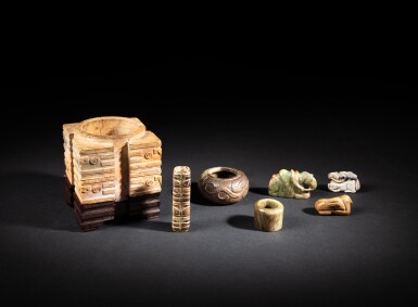 View full screen - View 1 of Lot 74. A group of seven archaistic jade carvings, Qing dynasty - Republican period | 清至民國 仿古玉器一組七件.