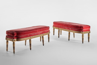 View full screen - View 1 of Lot 25. A Pair of Royal Louis XVI Cream-Painted and Parcel-Gilt Banquettes by Georges Jacob, Circa 1785.