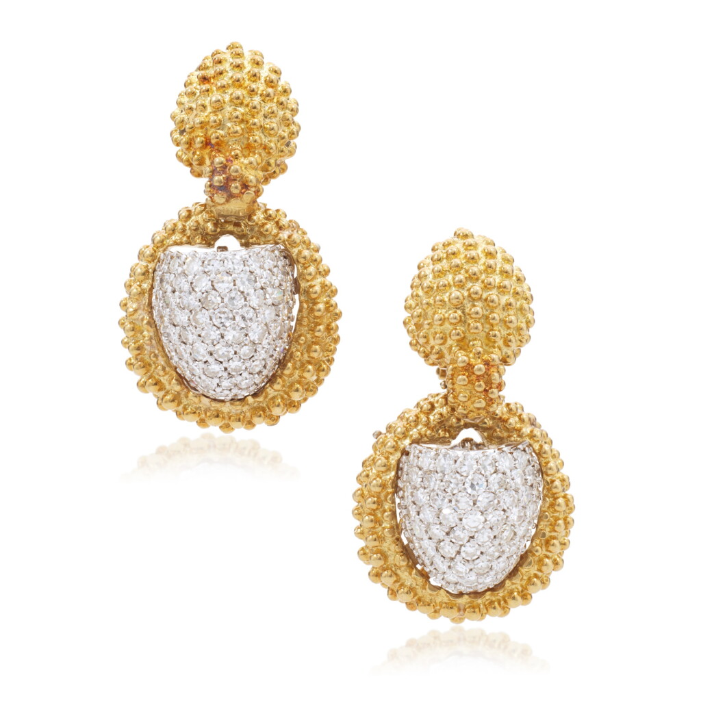 View full screen - View 1 of Lot 1026. Pair of gold and diamond pendent ear clips.