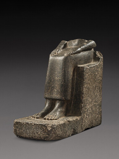 View full screen - View 1 of Lot 207. An Egyptian Granite or Basalt Statue of the King’s Sister Princess Sat-hathor, 13th Dynasty, 1759-1640 B.C..