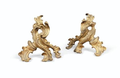 View full screen - View 1 of Lot 1114. A Pair of gilt bronze fire dogs in the Louis XV style | Paire de chenets en bronze doré de style Louis XV.