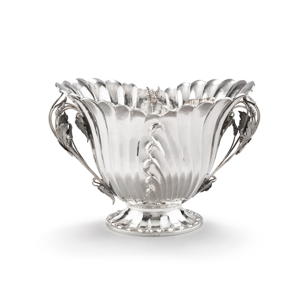 View full screen - View 1 of Lot 50. An Italian large silver wine-cooler for two bottles, Buccellati, Milan, circa 1980 | Grand seau à rafraîchir pour deux bouteilles en argent par Buccellati, Milan, vers 1980.