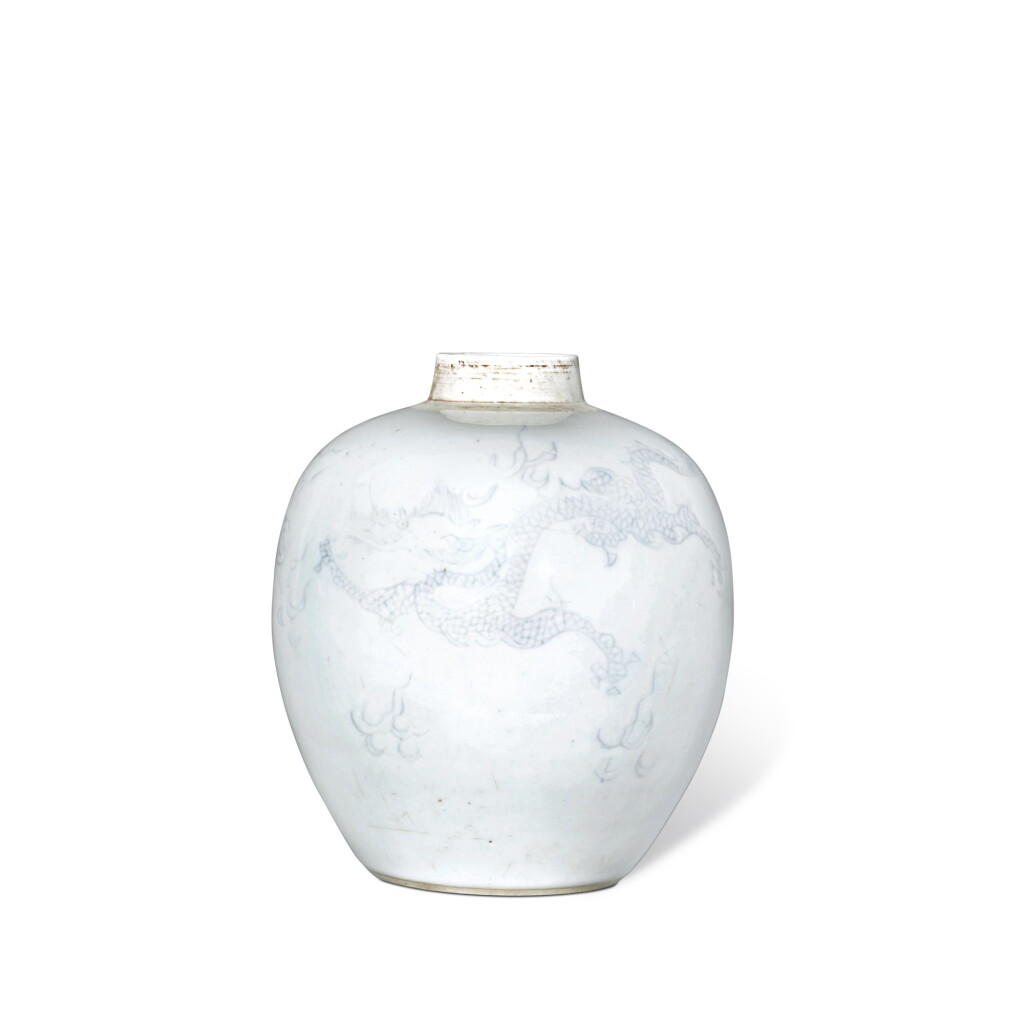 View full screen - View 1 of Lot 62. A white-glazed blue and white 'dragon' jar, Qing dynasty, Kangxi period .
