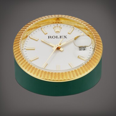 View full screen - View 1 of Lot 8850. A gilt brass desk clock with date, Circa 2007 | 勞力士 | 鍍金銅製座鐘,備日期顯示,約2007年製.