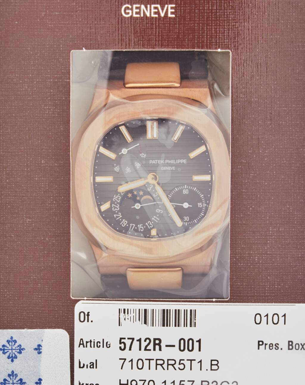 View full screen - View 1 of Lot 156. Reference 5712R-001 Nautilus | A pink gold automatic wristwatch with date, power reserve indication and moon phases, Double Sealed, Circa 2015.
