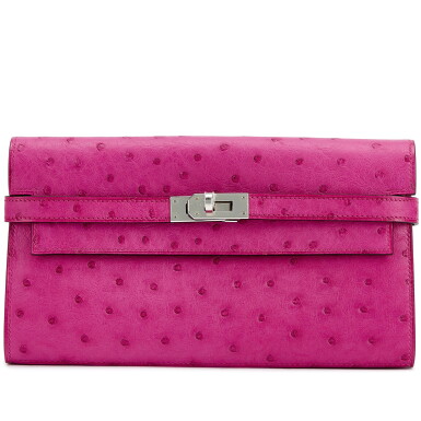 View full screen - View 1 of Lot 5477. Rose Pourpre Ostrich Kelly Wallet Palladium Hardware, 2019.