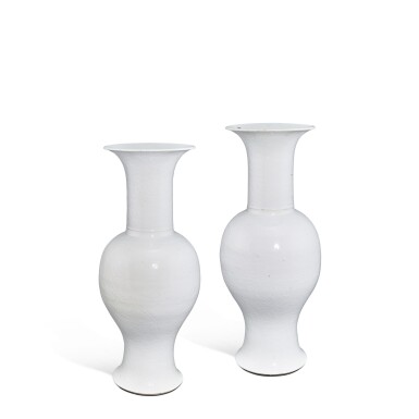 View full screen - View 1 of Lot 36. A rare pair of large carved white-glazed phoenix-tail vases, Qing dynasty, Kangxi period.