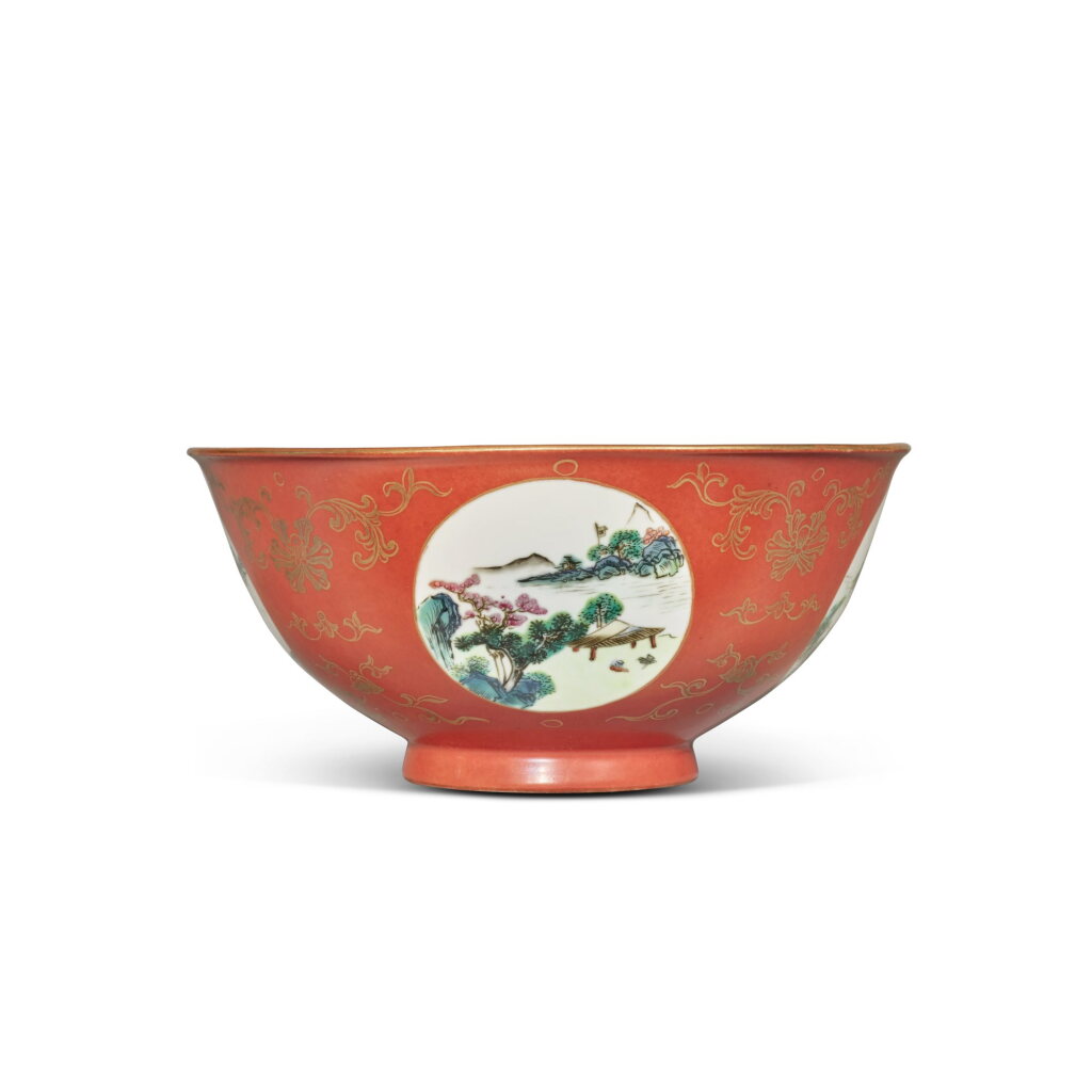 View full screen - View 1 of Lot 789. A coral-ground famille-rose 'medallion' bowl, 19th / 20th century | 十九 / 二十世紀 珊瑚紅地粉彩開光山水圖盌.