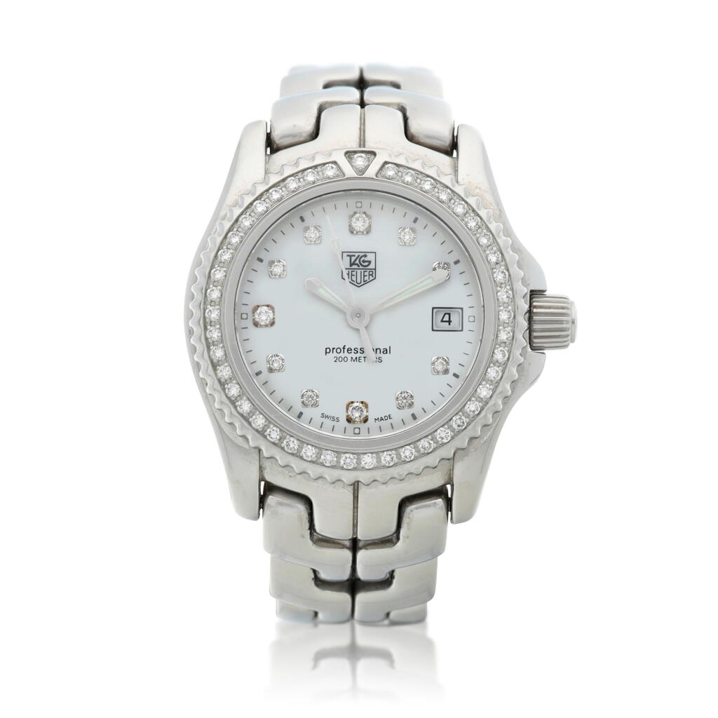 View full screen - View 1 of Lot 84. Reference WT131E A stainless steel and diamond-set wristwatch with date and mother-of-pearl dial, Circa 2010.