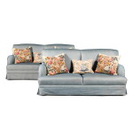 A pair of Edwardian style upholstered sofas, late 20th century, in the manner of Howard & Sons
