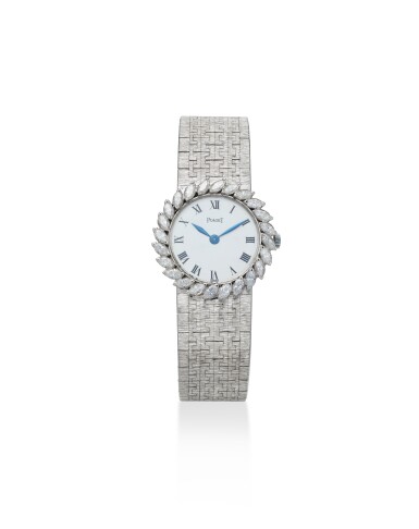 View full screen - View 1 of Lot 2016. A white gold and diamond-set bracelet watch, Circa 1975.