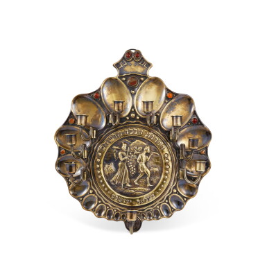 View full screen - View 1 of Lot 25. A Bezalel Brass Hanukah Lamp, Jerusalem, Circa 1925.