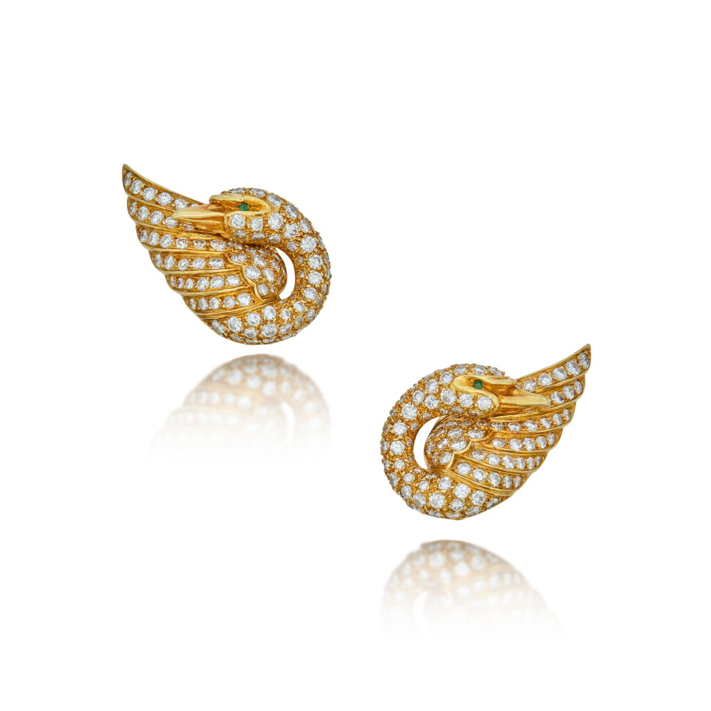 View full screen - View 1 of Lot 209. Pair of Diamond and Emerald Earclips, France.