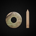 A celadon jade disc, yuan, and a jade blade, ge, Shang dynasty 商 青玉瑗及玉戈 一組兩件