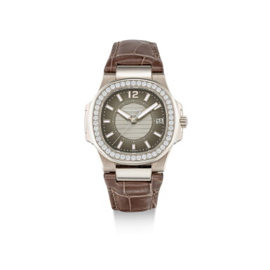 View full screen - View 1 of Lot 351. PATEK PHILIPPE | NAUTILUS, REFERENCE 7010, A WHITE GOLD AND DIAMOND-SET WRISTWATCH WITH DATE, CIRCA 2011.