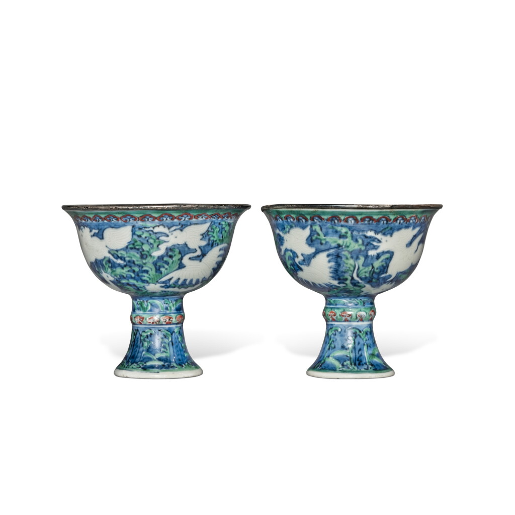 View full screen - View 1 of Lot 118. An extremely rare pair of blue and white 'mythical beasts' stem cups, Marks and period of Wanli.