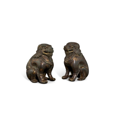 View full screen - View 1 of Lot 3577. A pair of gilt-bronze seated Buddhist lions, Late Tang dynasty | 晚唐 銅鎏金坐獅一對.