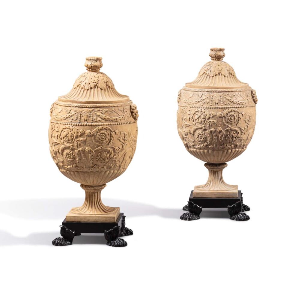 View full screen - View 1 of Lot 1014. A pair of patinated terracotta covered urns mounted as lamps, Manifattura di Signa, Florence, early 20th century, after the cinerary urn of Aurelius Victor in the Museo Pio Clementino.
