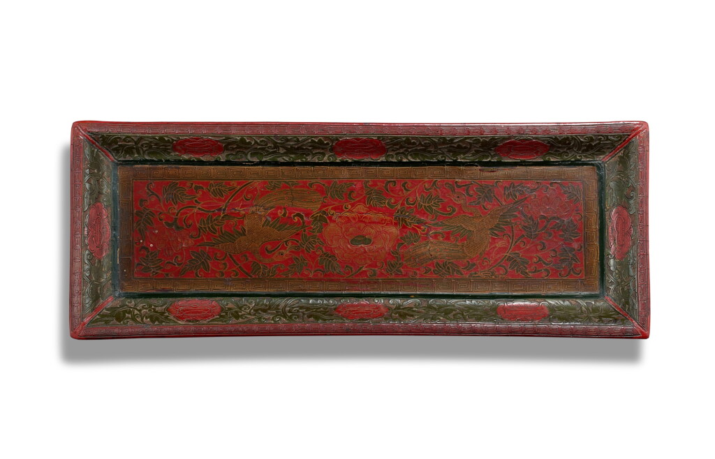 View full screen - View 1 of Lot 9883. A rare carved polychrome qiangjin and tianqi lacquer tray, Southern Song dynasty | 南宋 剔彩戧金填漆孔雀牡丹紋折沿長方盤.