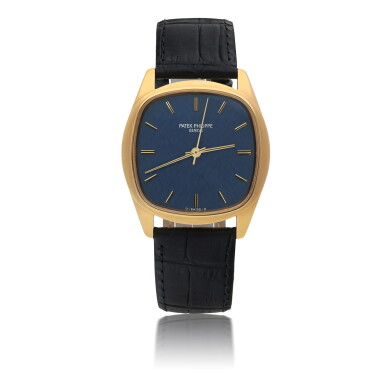 View full screen - View 1 of Lot 56. PATEK PHILIPPE | REF 3585 YELLOW GOLD WRISTWATCH WITH TEXTURED BLUE DIAL MADE IN 1980.