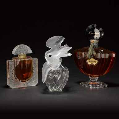 View full screen - View 1 of Lot 48. Three French glass large scent bottles, modern.