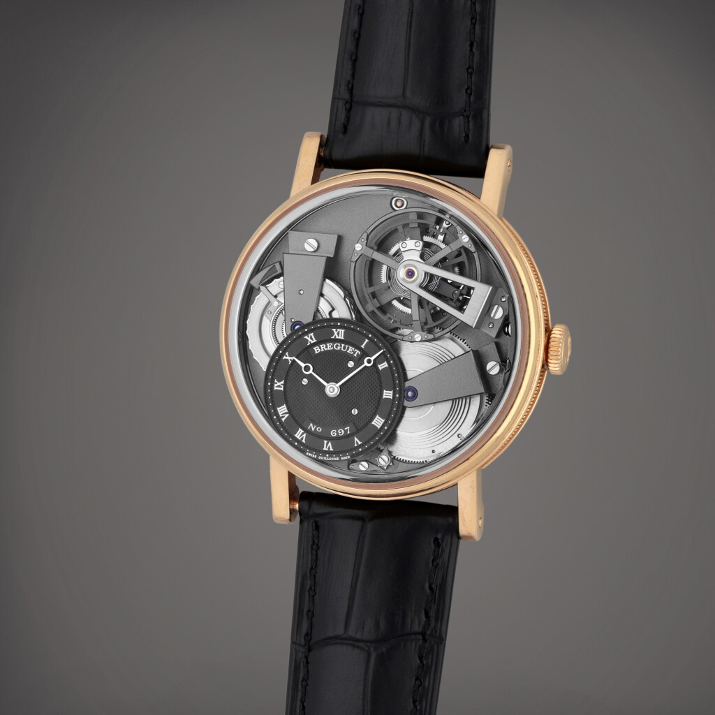 View full screen - View 1 of Lot 127. Reference 7047BR/G9/9ZU Tradition ‘Grande Complication | A pink gold semi-skeletonized wristwatch with chain and fusée, silicon balance spring and power reserve indication, Circa 2013.