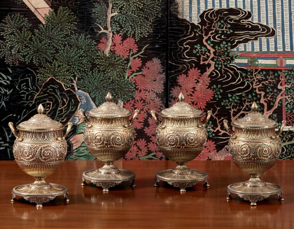 View full screen - View 1 of Lot 109. A Set of Four George III Silver-Gilt Sugar Vases and Covers, Digby Scott & Benjamin Smith for Rundell, Bridge & Rundell, London, 1805.