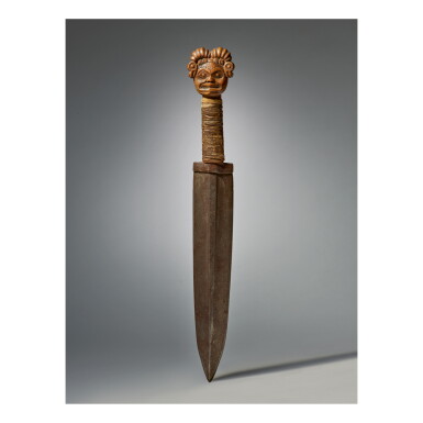 View full screen - View 1 of Lot 47. TLINGIT DAGGER WITH WOODWORM POMMEL.