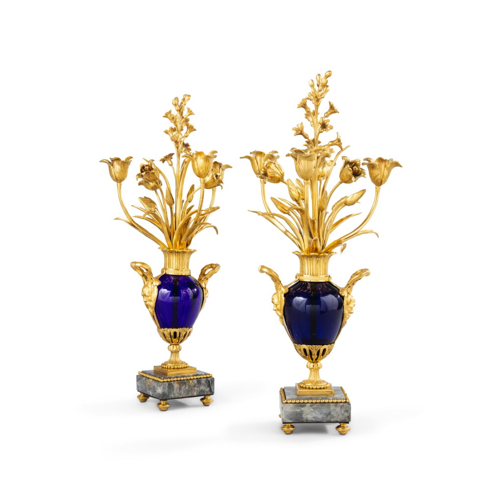 View full screen - View 1 of Lot 563. A pair of Louis XVI gilt-bronze mounted three-light candelabra, circa 1775.