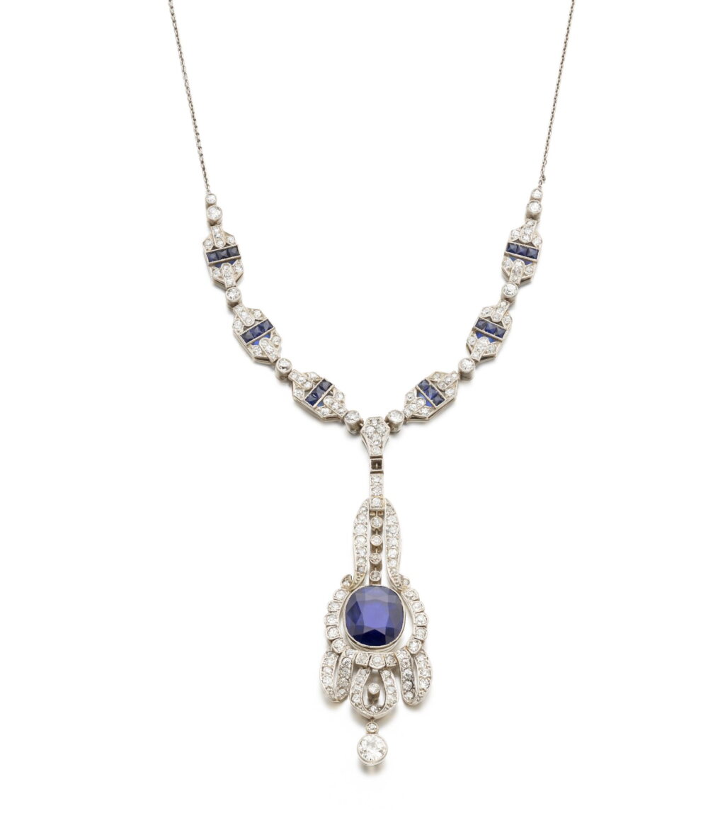 View full screen - View 1 of Lot 1039. Sapphire and diamond pendent necklace, circa 1916.