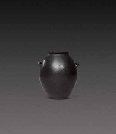 View full screen - View 1 of Lot 110. An Egyptian Black Basalt Jar, Predynastic Period (Naqada II)/1st Dynasty, circa 3500-2900 B.C..