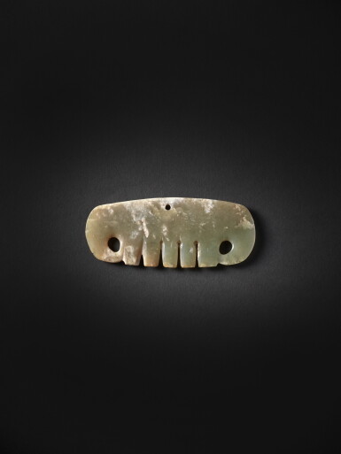 View full screen - View 1 of Lot 244. An archaic celadon jade cloud-shaped pendant, Neolithic period, Hongshan culture | 新石器時代 紅山文化 玉雲形珮.