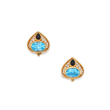View full screen - View 1 of Lot 447. Pair of Blue Topaz, Onyx and Diamond Earclips.