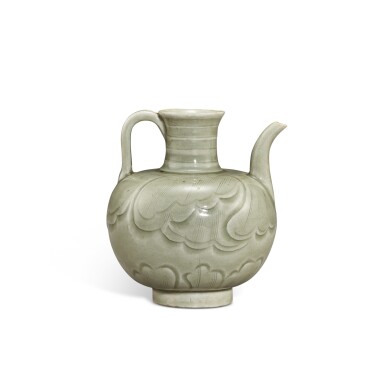 View full screen - View 1 of Lot 9526. A small Yueyao celadon-glazed 'floral' ewer, Song dynasty or later | 宋或更晚 越窰青釉劃花瓣紋執壺.