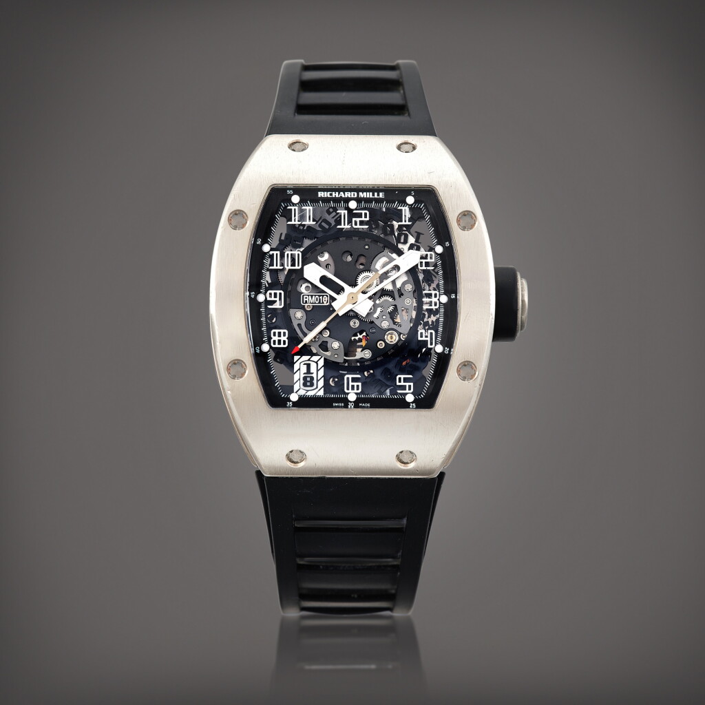View full screen - View 1 of Lot 2280. Reference RM010 | A white gold semi-skeletonised wristwatch with date, Circa 2008 | Richard Mille | 型號 RM010 | 白金半鏤空腕錶,備日期顯示,約2008年製.