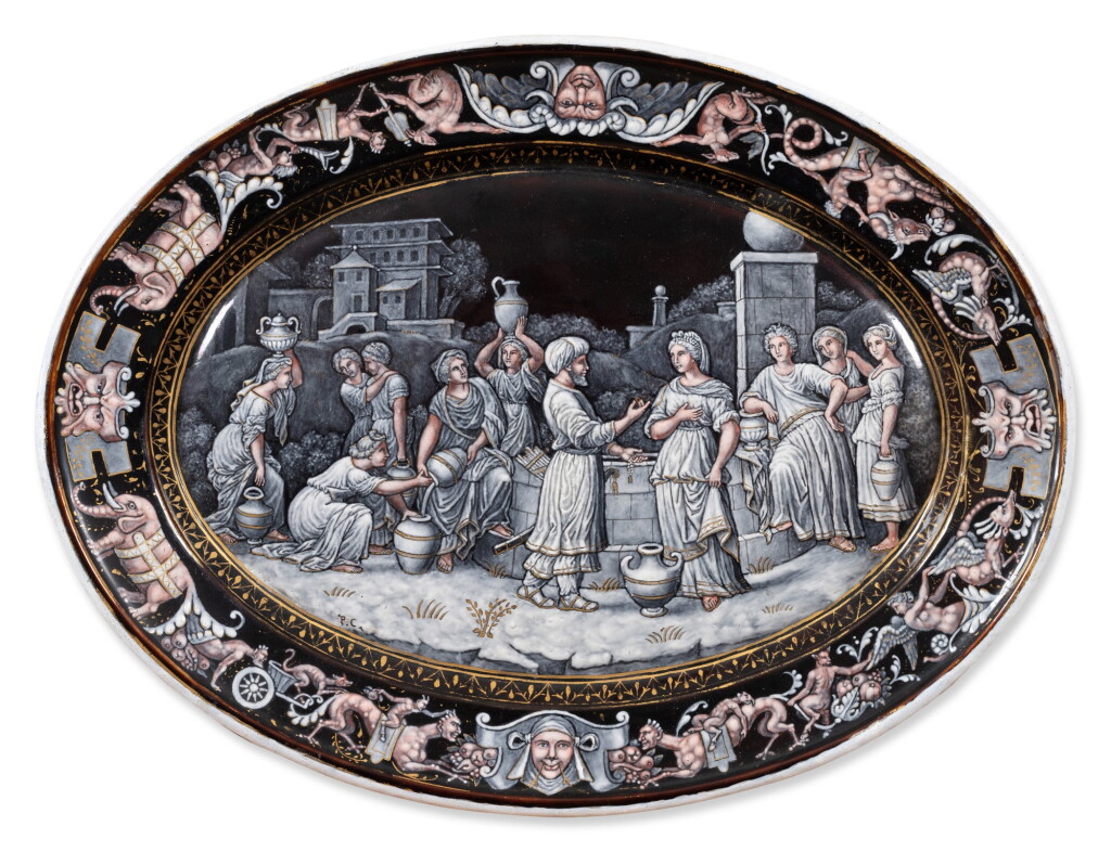 View full screen - View 1 of Lot 1363. A French oval grisaille painted enamel dish depicting Rebecca at the Well, after Nicolas Poussin (1594-1665), 19th century.