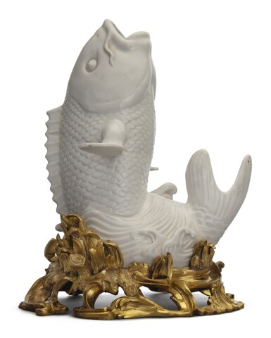 View full screen - View 1 of Lot 702. A JAPANESE WHITE PORCELAIN CARP WITH LOUIS XV STYLE GILT BRONZE MOUNTS, 19TH CENTURY.