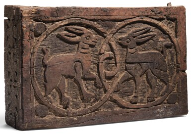 View full screen - View 1 of Lot 97. A FATIMID CARVED WOODEN PLAQUE WITH TWO HARES, EGYPT, 11TH-12TH CENTURY.