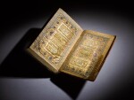 An illuminated Qur'an, copied by Yaqut Raqam Khan, known as 'Arif Muhammad, India, Mughal, 18th century, with lacquer binding signed by 'Ali Ashraf, dated 1159 AH/1746-47 AD