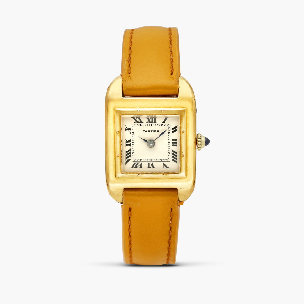 View full screen - View 1 of Lot 2484. Santos Droit | A very rare and early yellow gold wristwatch with original early gold deployant clasp, Circa 1915.