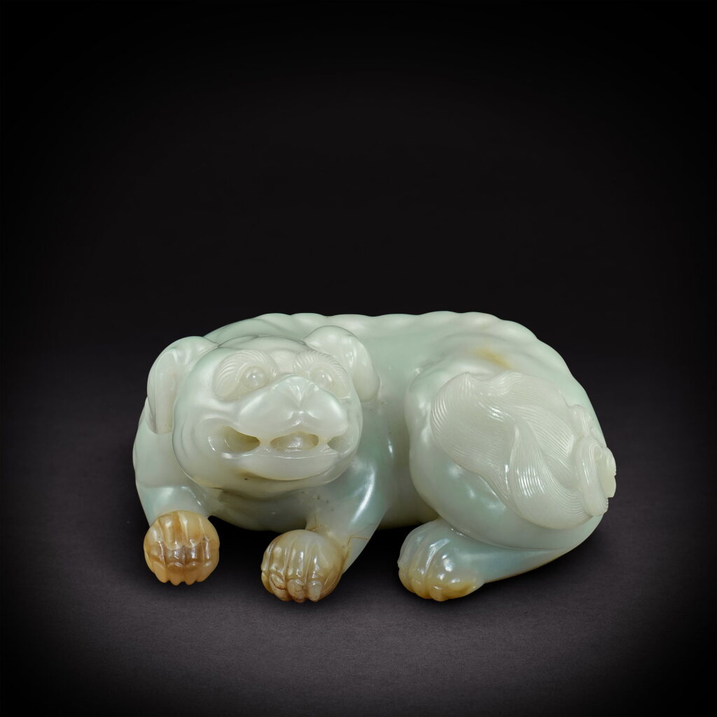 View full screen - View 1 of Lot 3557. A celadon Buddhist lion, Qing dynasty, 18th century | 清十八世紀 青玉福獅.