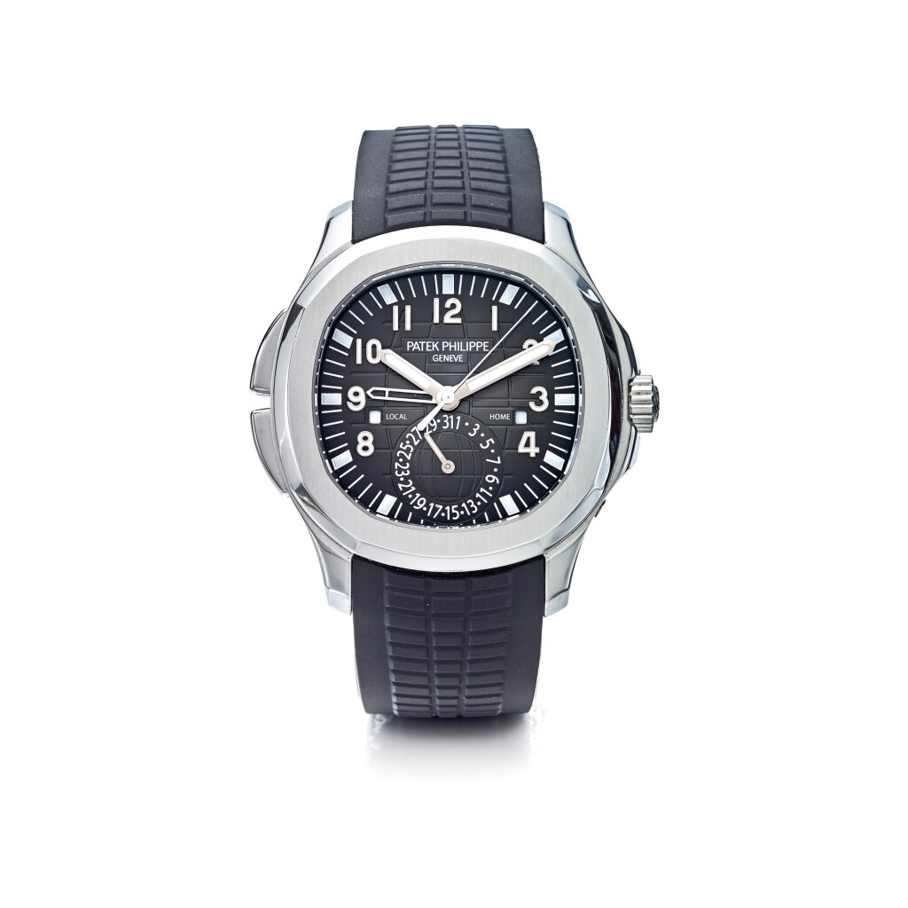 View full screen - View 1 of Lot 816. PATEK PHILIPPE | REF 5164A AQUANAUT TRAVEL TIME, A STAINLESS STEEL AUTOMATIC DUAL TIME WRISTWATCH WITH DATE AND DAY AND NIGHT INDICATION, CIRCA 2017 | 百達翡麗 | 5164A型號「AQUANAUT TRAVEL TIME」精鋼自動上鏈兩地時間腕錶備日期及晝夜顯示,年份約2017.